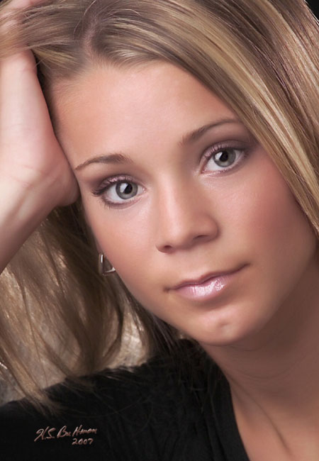 Portrait of a beautiful young lady photographed by Bultmans Studios.
